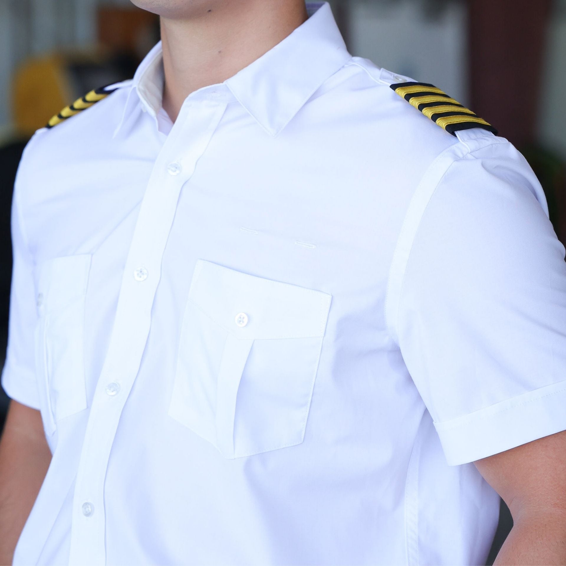 close up of person wearing Skyshield's Men's Signature Short Sleeve pilot uniform shirt